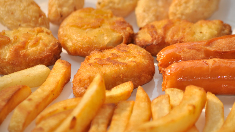 french fries, chicken nuggets, and hot dogs