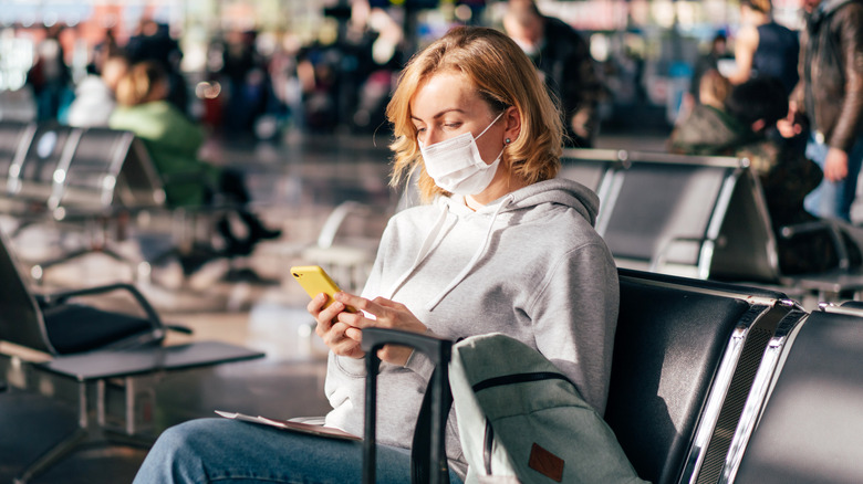 Woman sitting in airport