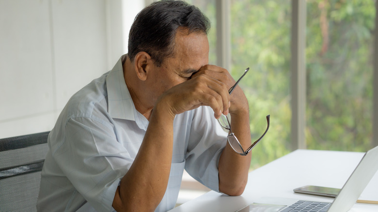 Stressed man at desk