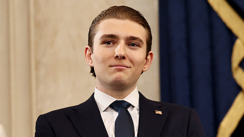 Barron Trump smiling at official event