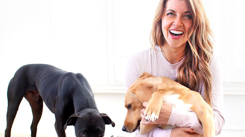 Gianna laughing with her dogs