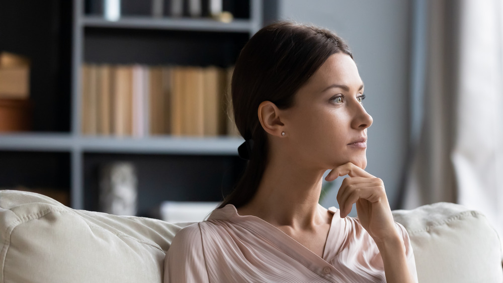 Woman staring off into space