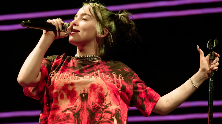 Billie Eilish performing in tie dye