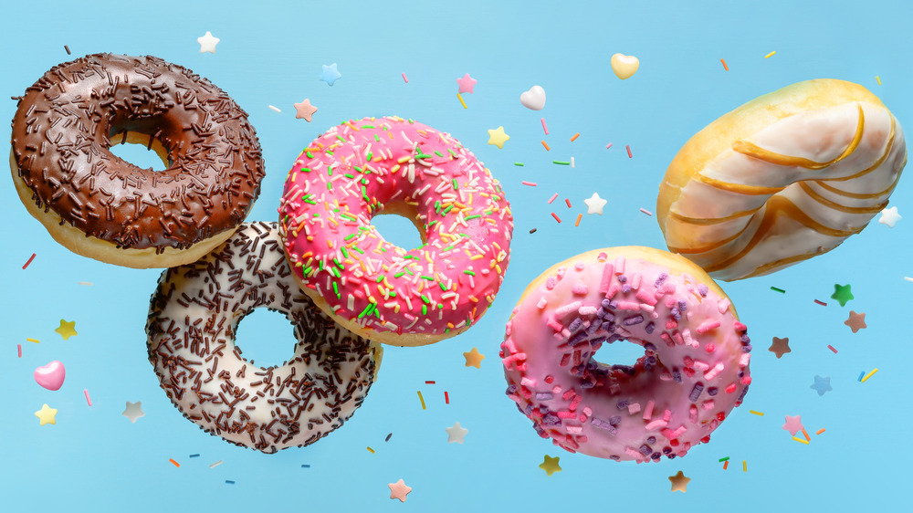 Flying donuts with blue background