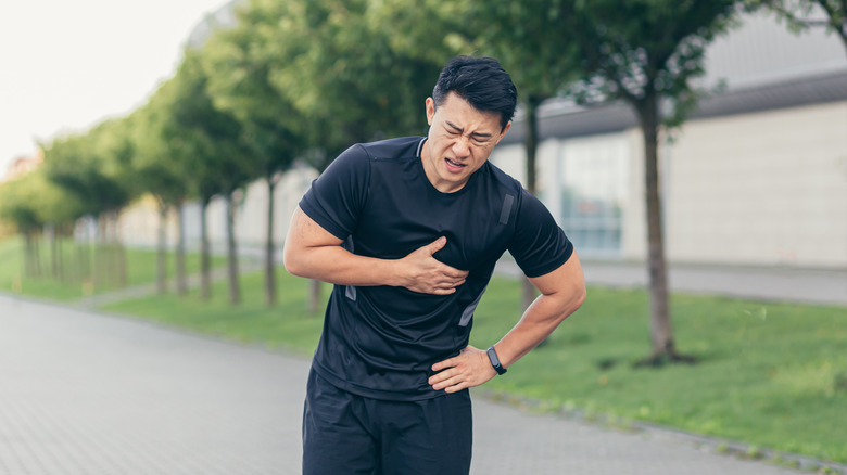 man feeling severe chest pain