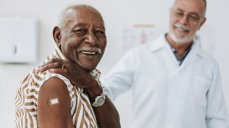 doctor and patient with bandage