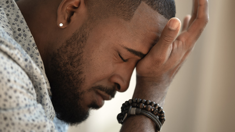 Man with a migraine