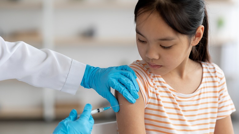 Child receiving HPV vaccine