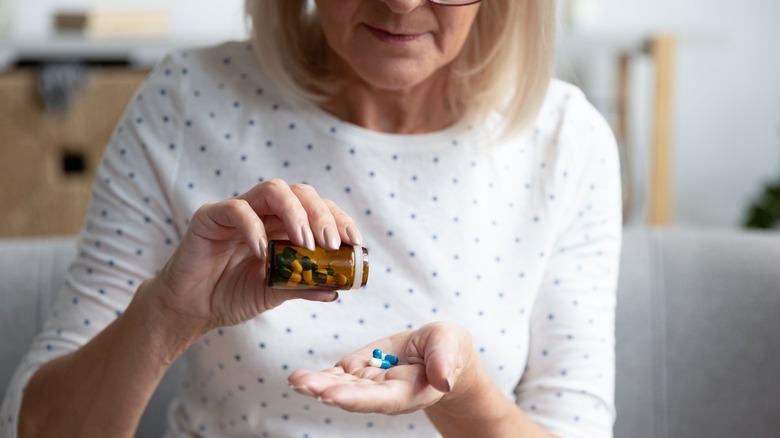 Woman taking antibiotics 