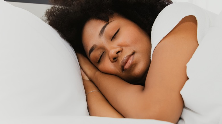 close-up of woman contentedly sleeping