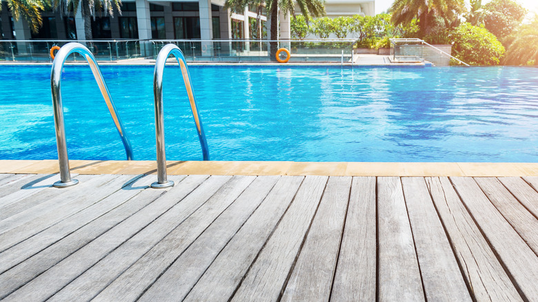 Outdoor deck and pool with handlebars 