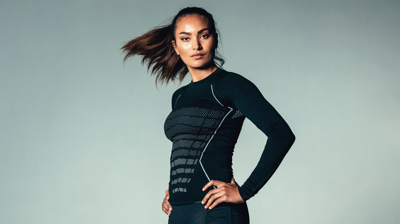 Fit woman wearing a compression top