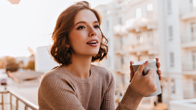 Woman drinking coffee