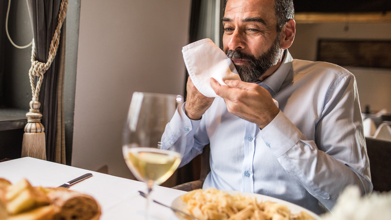 Man eating at a restaurant