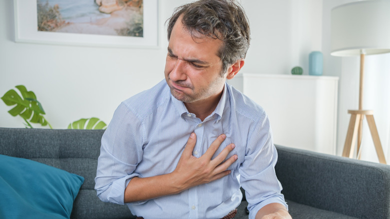 A man has heartburn