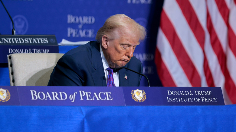 President Donald Trump shutting his eyes during Board of Peace speeches
