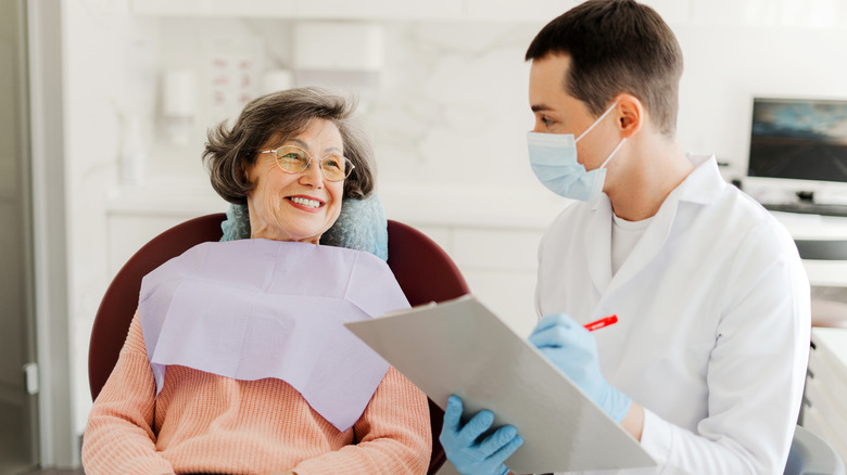 patient talking with dentist