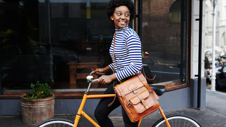 Woman riding bicycle in city