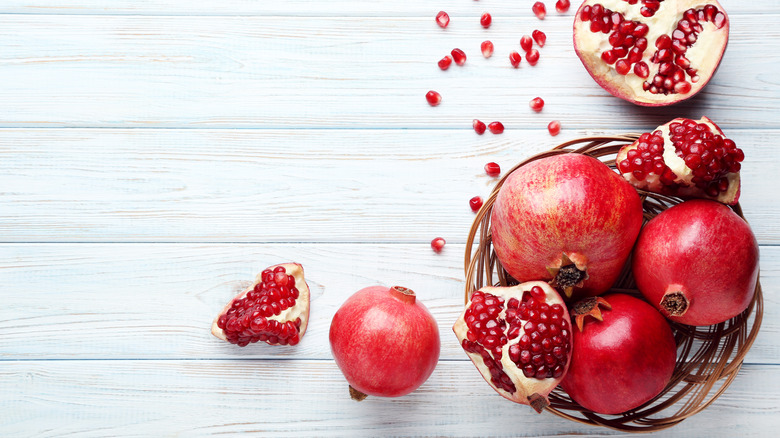 a basket of pomegranates