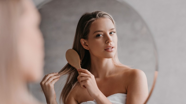 woman combing hair