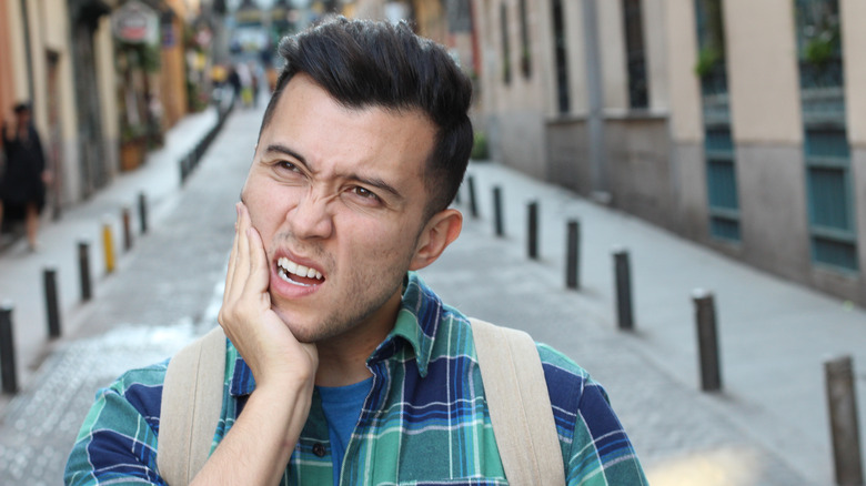 A man has an injured jaw