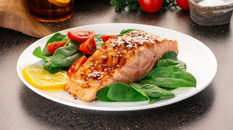 fish and salad on plate