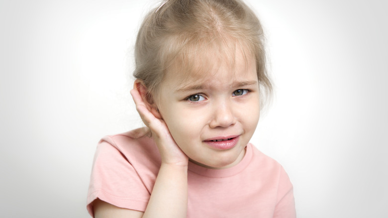 child in pain with ear infection