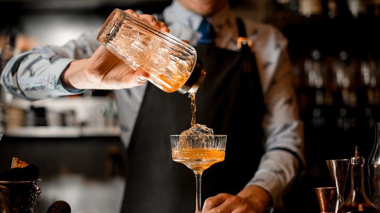 Bartender pouring a drink