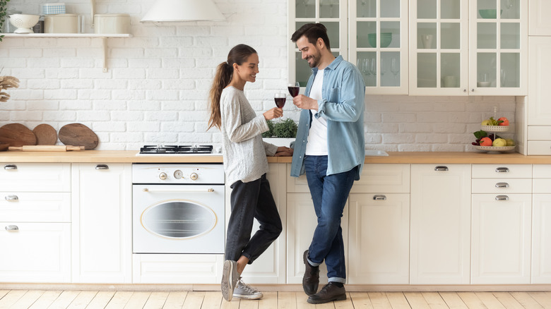 couple toasting with wine glasses
