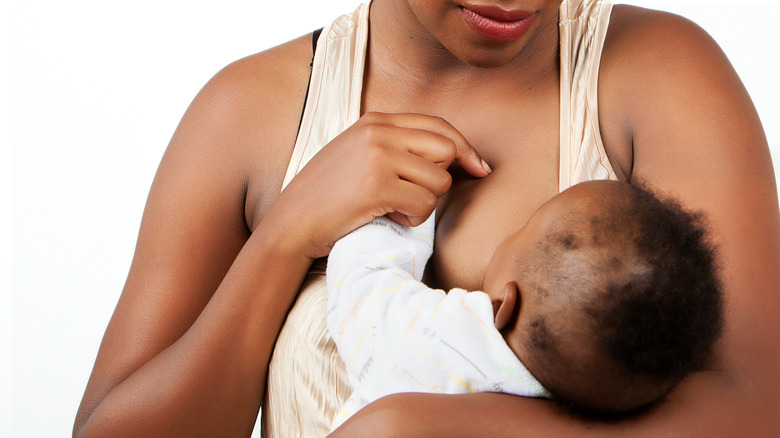 Woman breastfeeding baby