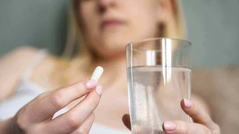 Woman will pill and water
