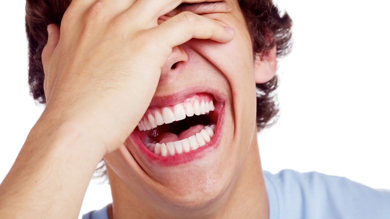 Close up portrait of man laughing