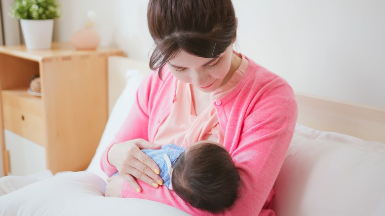 breastfeeding mother and her child