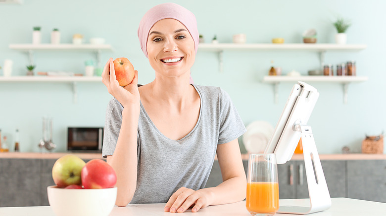 Woman in kitchen during chemotherapy