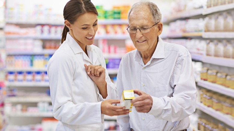 pharmacist consulting patient