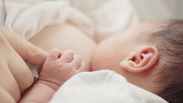 a newborn breastfeeding