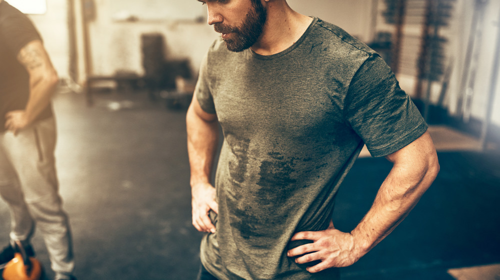 man sweating after workout