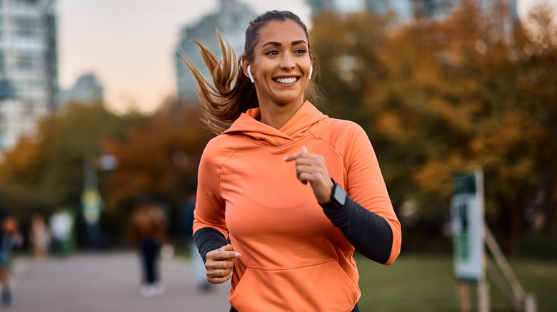 woman running on a running path