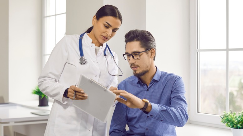 doctor sharing test results with a patient