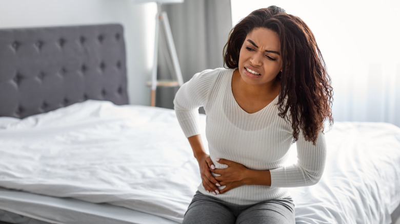 Woman with stomach pain