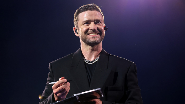 Musician Justn Timberlake smiling on stage