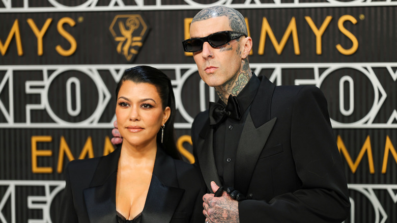 Kourtney Kardashian and Travis Barker attending the 75th Primetime Emmy Awards at Peacock Theater
