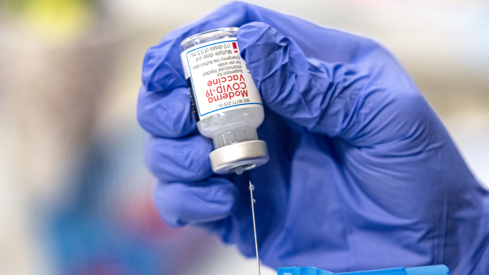 Covid vaccine bottle and syringe