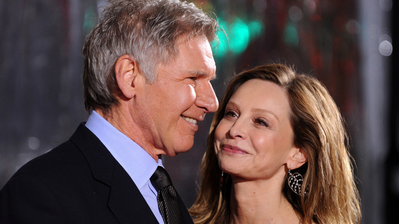 Harrison Ford and Calista Flockhart share a moment at a publicity event