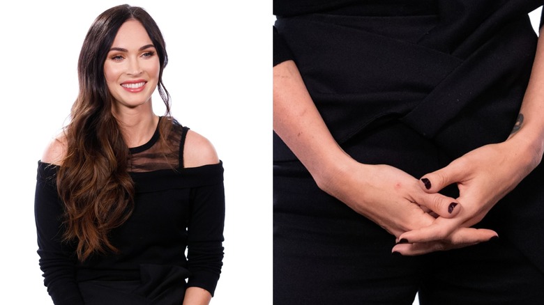 A closeup of Megan Fox's thumbs