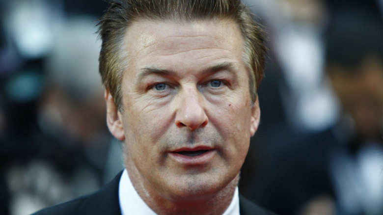 Alec Baldwin in black suit