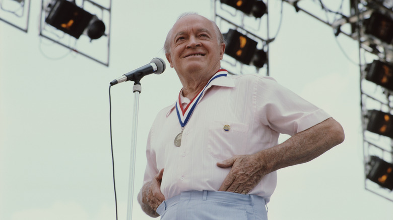 Bob Hope talking into a microphone