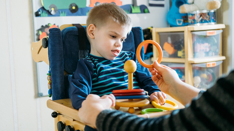 seated child with cerebral palsy