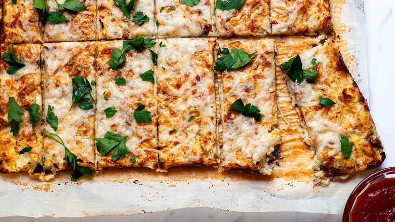 Colorful cauliflower cheesy breadsticks with parsley