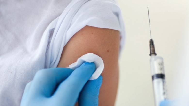child receiving COVID-19 vaccine